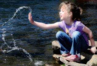 water and little girl